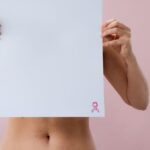 Women with polycystic ovary syndrome exhibit impaired endometrial receptivity with excessive ER and histone lactylation