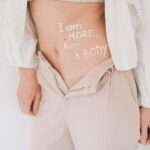 Women with polycystic ovary syndrome exhibit impaired endometrial receptivity with excessive ER and histone lactylation