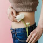 Women with polycystic ovary syndrome exhibit impaired endometrial receptivity with excessive ER and histone lactylation
