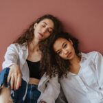 Women with polycystic ovary syndrome exhibit impaired endometrial receptivity with excessive ER and histone lactylation