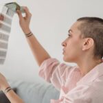Women with polycystic ovary syndrome exhibit impaired endometrial receptivity with excessive ER and histone lactylation