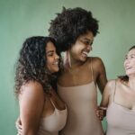 Women with polycystic ovary syndrome exhibit impaired endometrial receptivity with excessive ER and histone lactylation