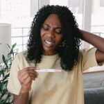 Women with polycystic ovary syndrome exhibit impaired endometrial receptivity with excessive ER and histone lactylation
