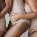 Women with polycystic ovary syndrome exhibit impaired endometrial receptivity with excessive ER and histone lactylation