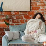 Women with polycystic ovary syndrome exhibit impaired endometrial receptivity with excessive ER and histone lactylation