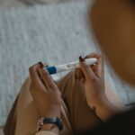 Women with polycystic ovary syndrome exhibit impaired endometrial receptivity with excessive ER and histone lactylation