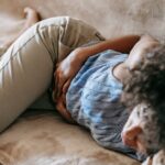 Women with polycystic ovary syndrome exhibit impaired endometrial receptivity with excessive ER and histone lactylation