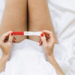 Women with polycystic ovary syndrome exhibit impaired endometrial receptivity with excessive ER and histone lactylation