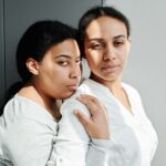 Women with polycystic ovary syndrome exhibit impaired endometrial receptivity with excessive ER and histone lactylation