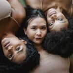 Women with polycystic ovary syndrome exhibit impaired endometrial receptivity with excessive ER and histone lactylation
