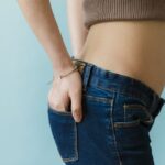 Women with polycystic ovary syndrome exhibit impaired endometrial receptivity with excessive ER and histone lactylation