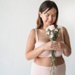Women with polycystic ovary syndrome exhibit impaired endometrial receptivity with excessive ER and histone lactylation