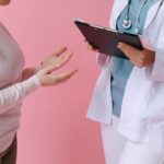 Women with polycystic ovary syndrome exhibit impaired endometrial receptivity with excessive ER and histone lactylation