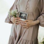 Women with polycystic ovary syndrome exhibit impaired endometrial receptivity with excessive ER and histone lactylation