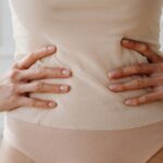 Women with polycystic ovary syndrome exhibit impaired endometrial receptivity with excessive ER and histone lactylation